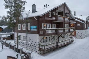 Отель Levikaira Apartments - Alpine Chalets  Киттила